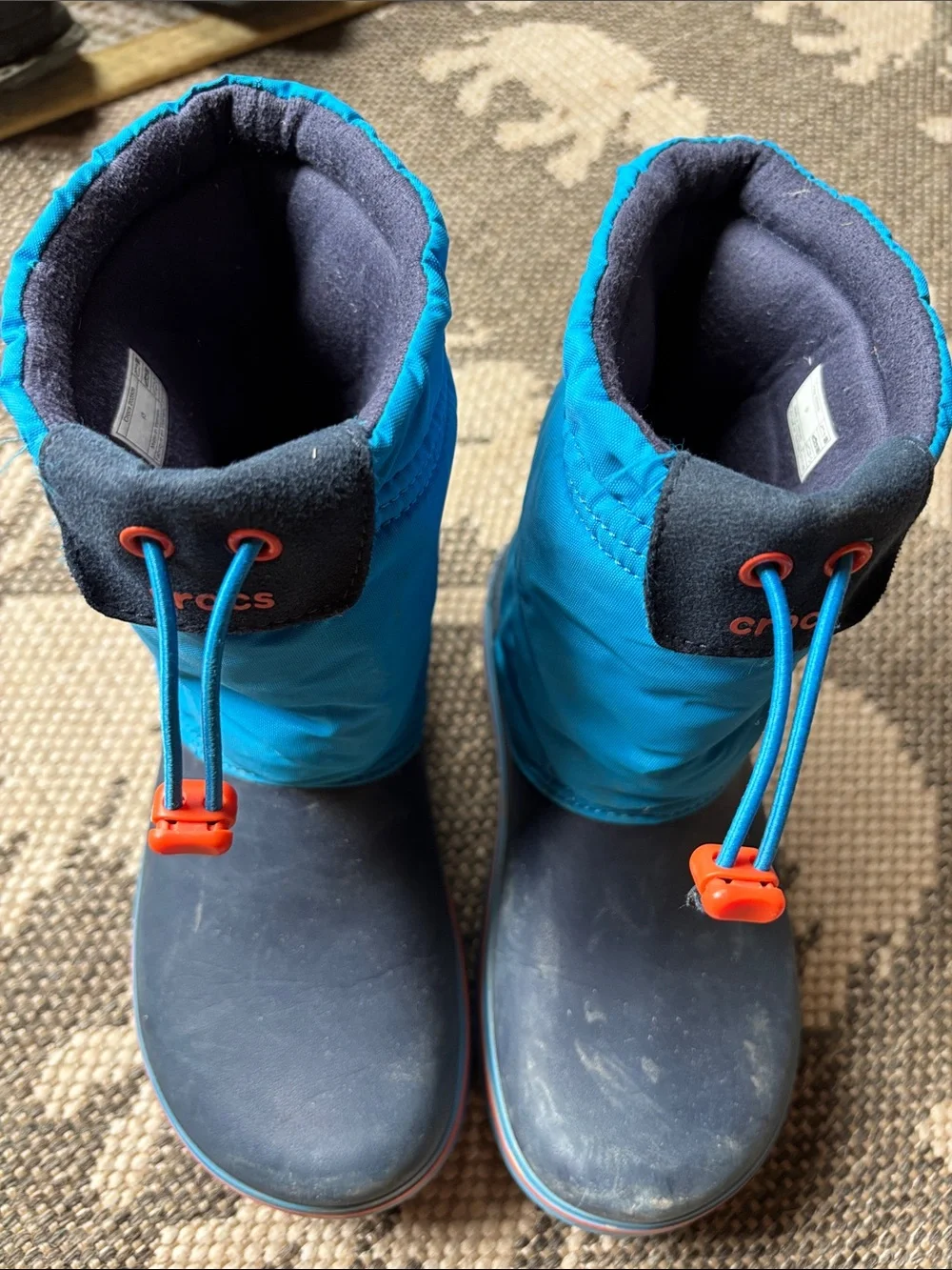CROCS Kids Navy and Bright Blue Winter Boots with Orange Toggles